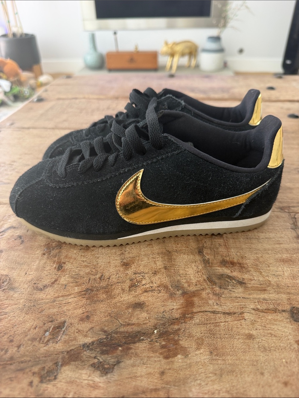 Nike Cortez women’s Black and Gold Suede Sneakers